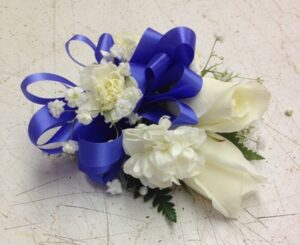 corsage with blue bow