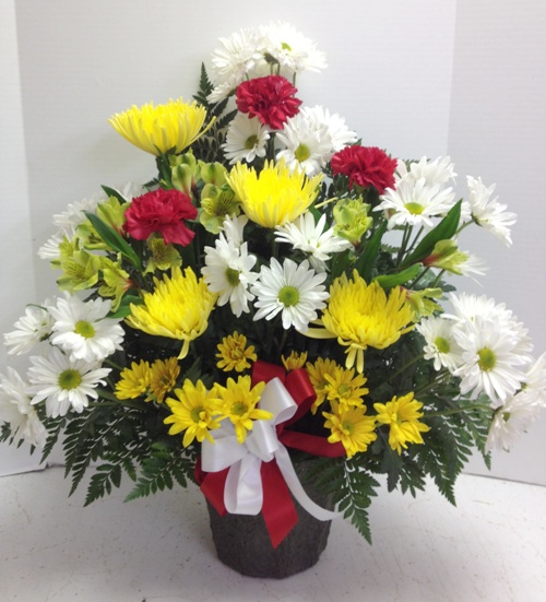Soft Memorial Flowers Designed by Roadrunner Florist