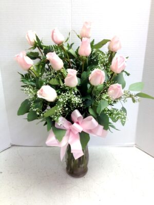 Pink roses with baby's breath