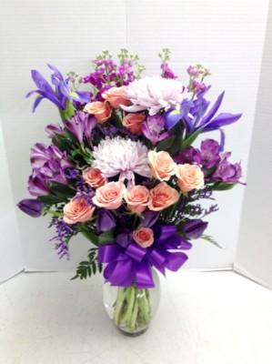 <img src="image.gif" alt="Purple flowers for John" />