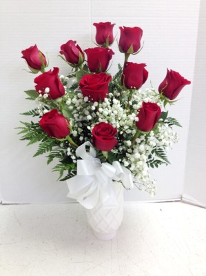 <img src="image.gif" alt="These are a Dozen Red Roses in a White Vase" />
