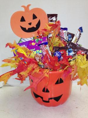 <img src="image.gif" alt="This is a pumpkin of Halloween candy" />