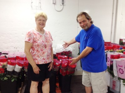 <img src="image.gif" alt="This is Pamela and Bob in the Cooler at Roy Houff" />