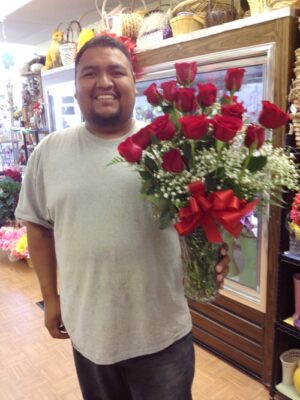 Happy Customer with Red Roses