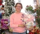 Tina holding a gift basket